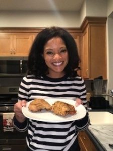 Erin Cooper, Creator of Hungry Fit Foodie holding her faux fried chicken recipes