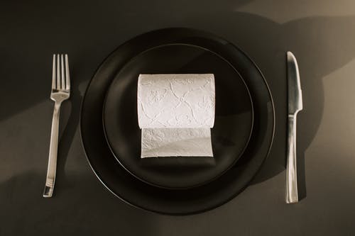 Toilet Paper on place setting. Enzymes