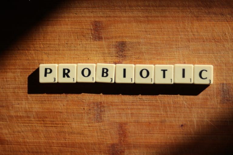 Best Probiotic for women. scrabble letters spelling Probiotic